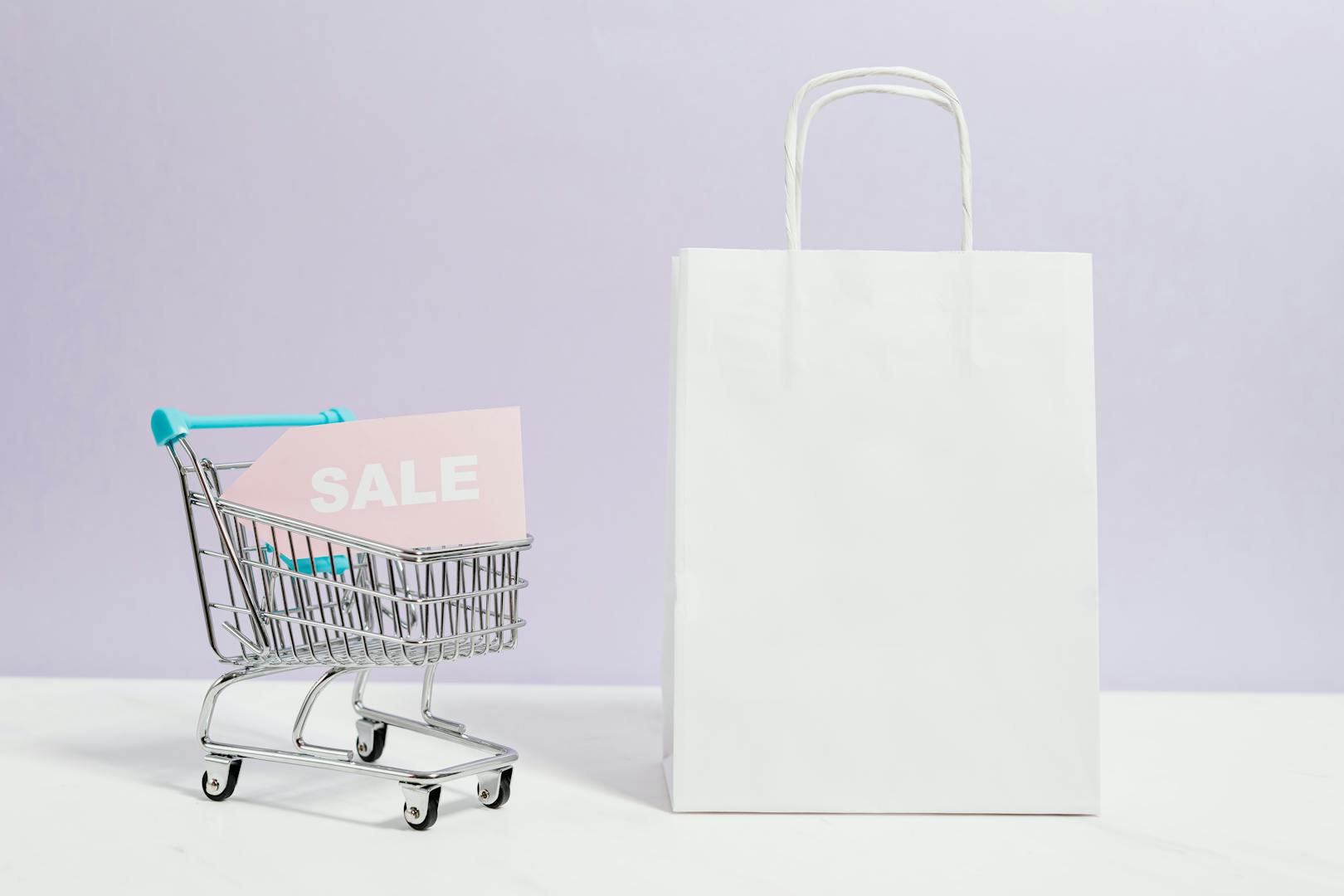 Hands holding shopping bags — online retail and ecommerce